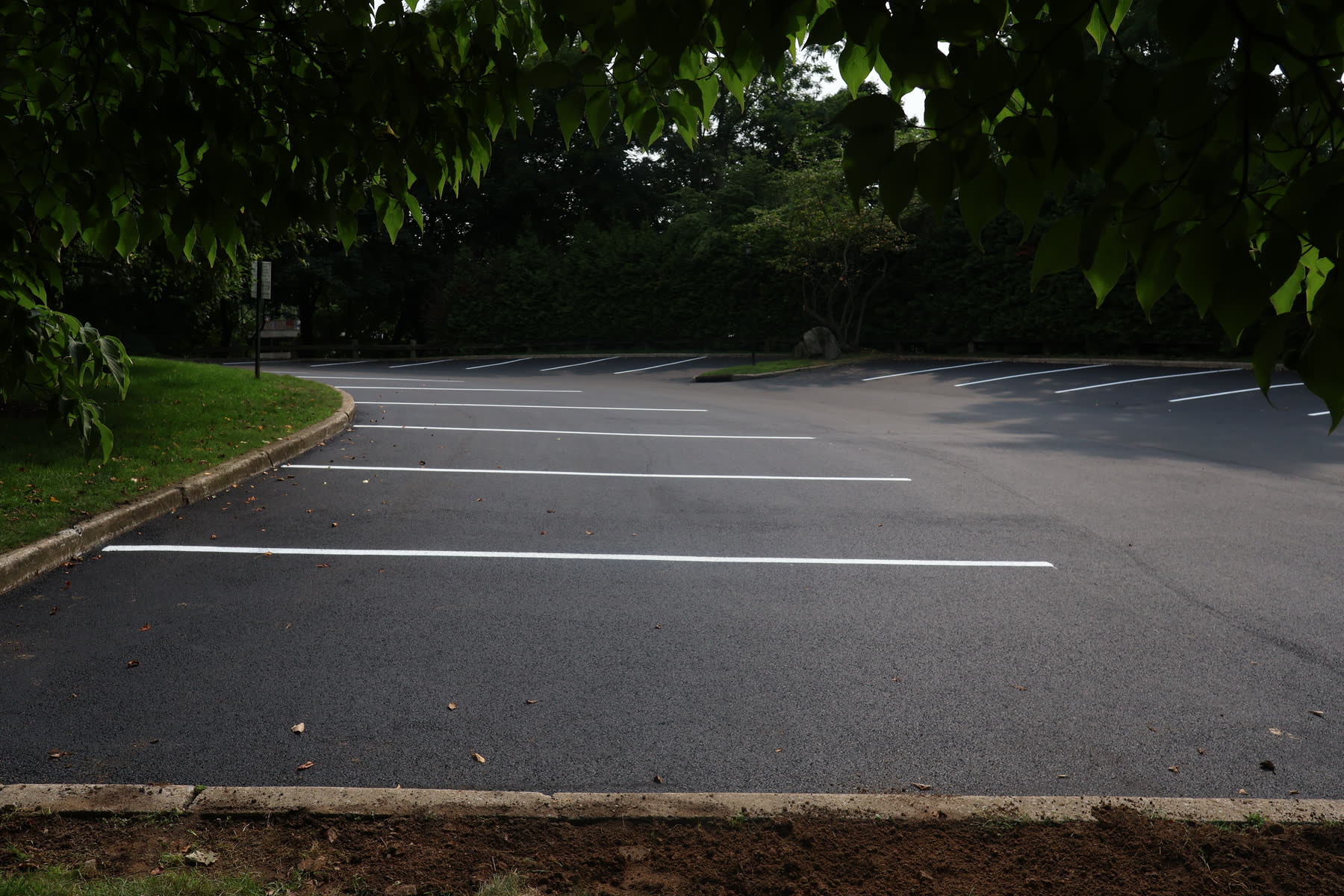 Freshly paved and striped apartment complex parking lot in Scarsdale, New York